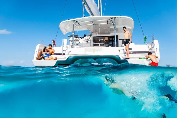 Sunset Experiences: Catamaran Day & Sunset Cruises with meals Drinks and transportation